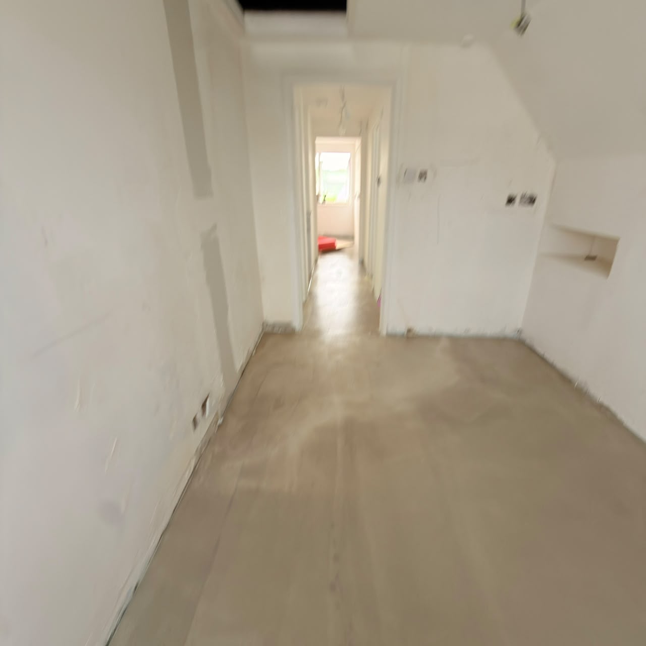 Before — Hallway levelled and prepared for flooring