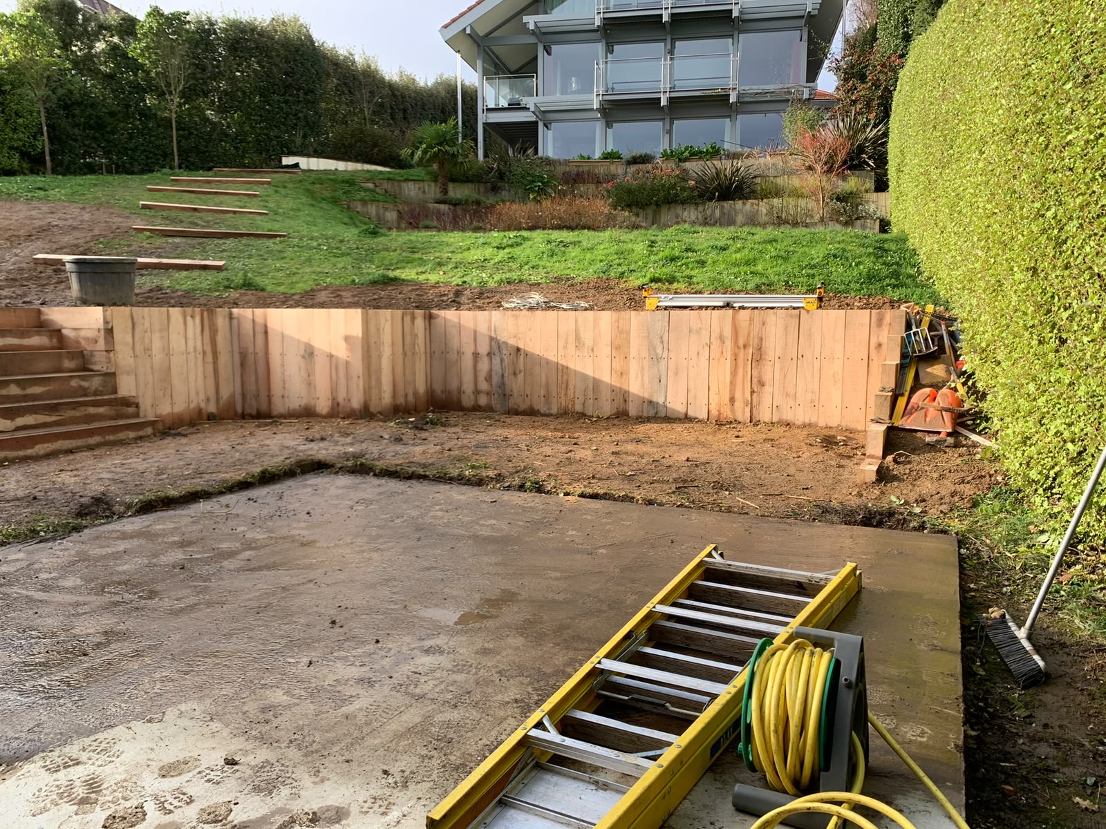 Wide view of the completed retaining wall and level terrace