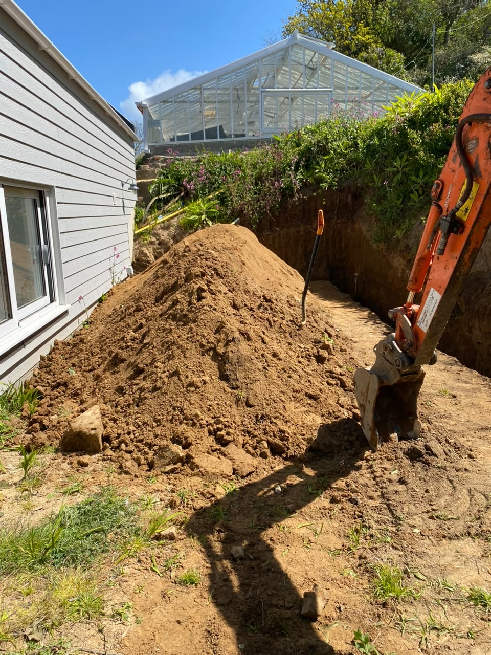 Before — Trenching for drainage and retaining works