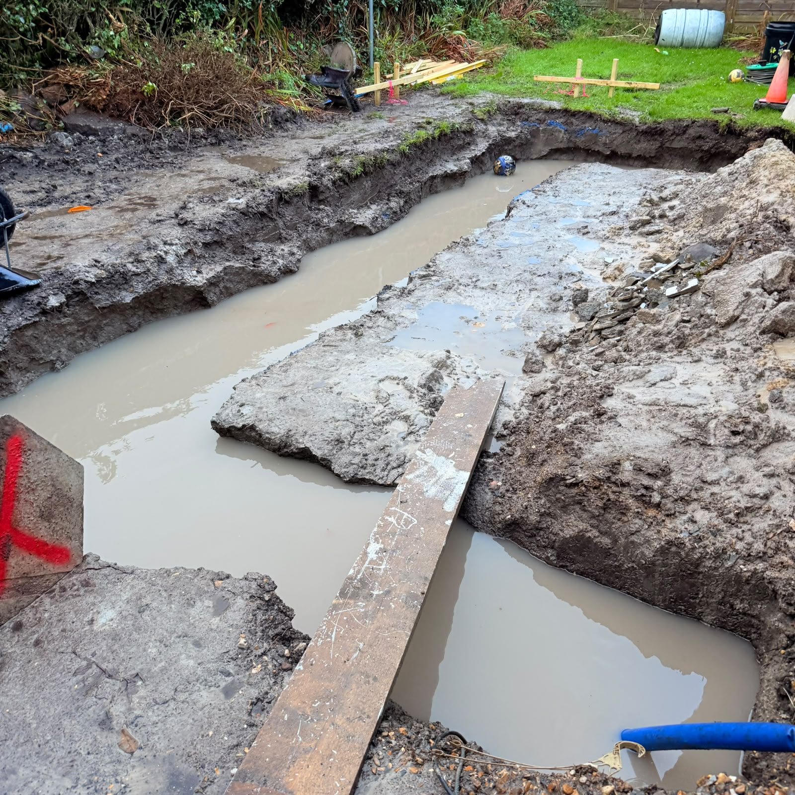 Deep footings dug out and cleared of standing water