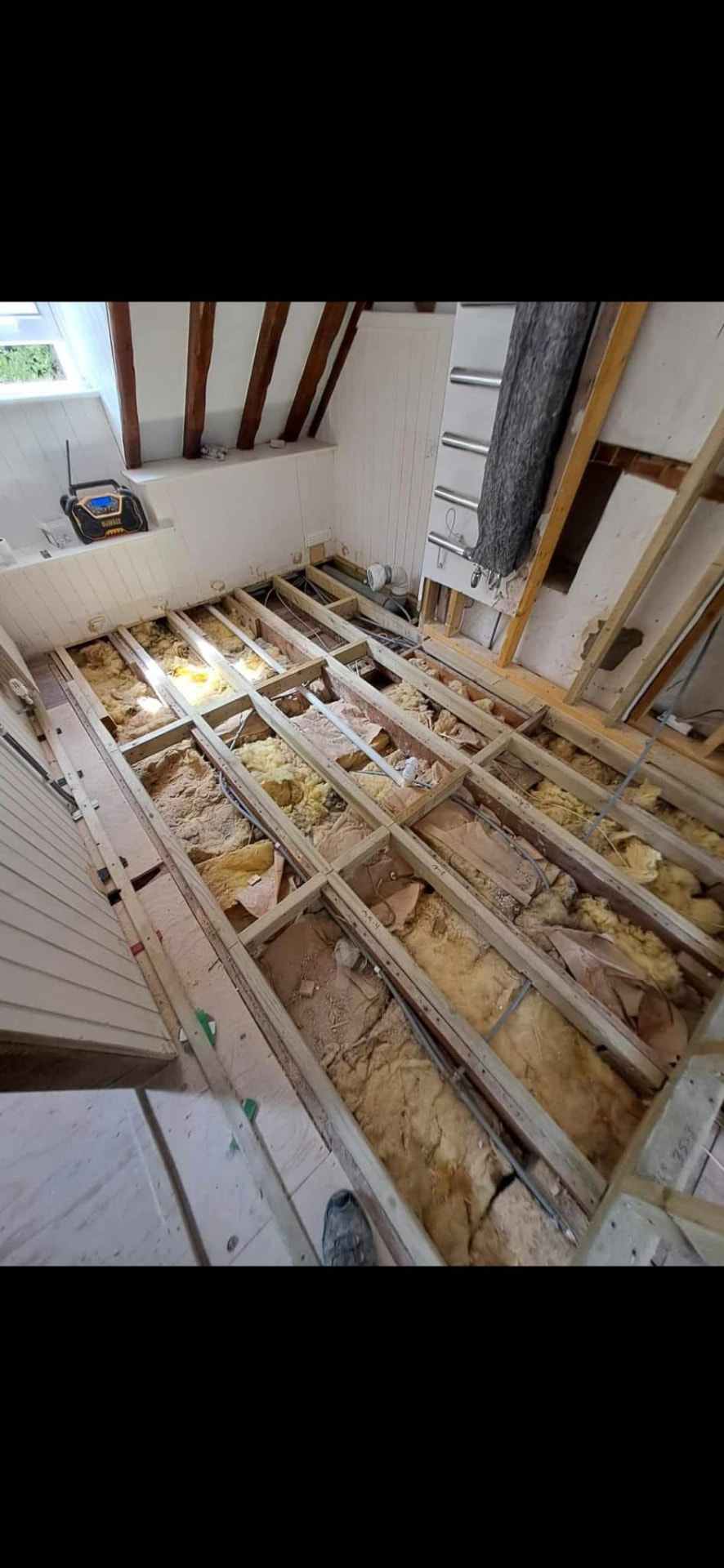 Floor opened up for strengthening, insulation and new service runs