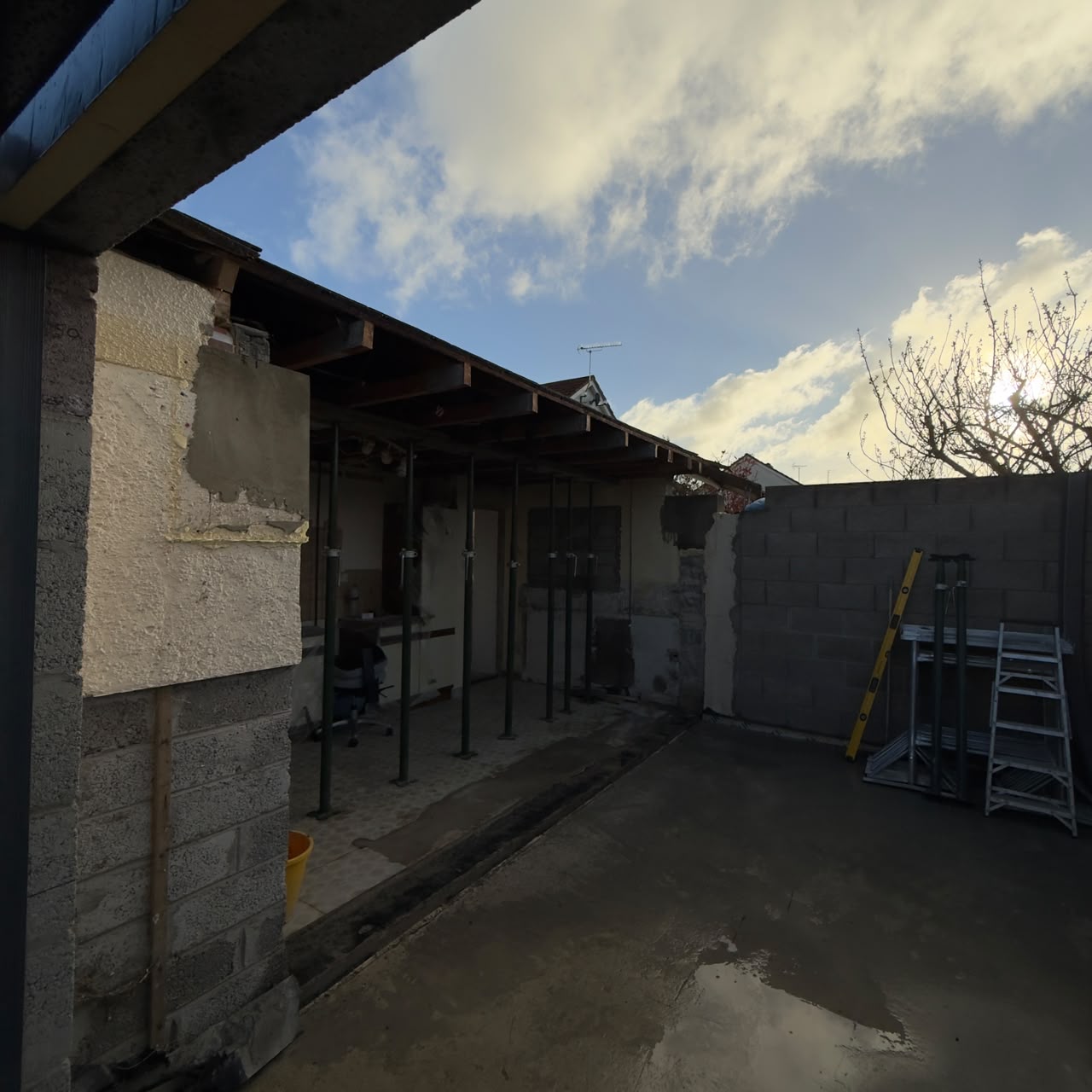 Existing structure propped and opened up for the new build