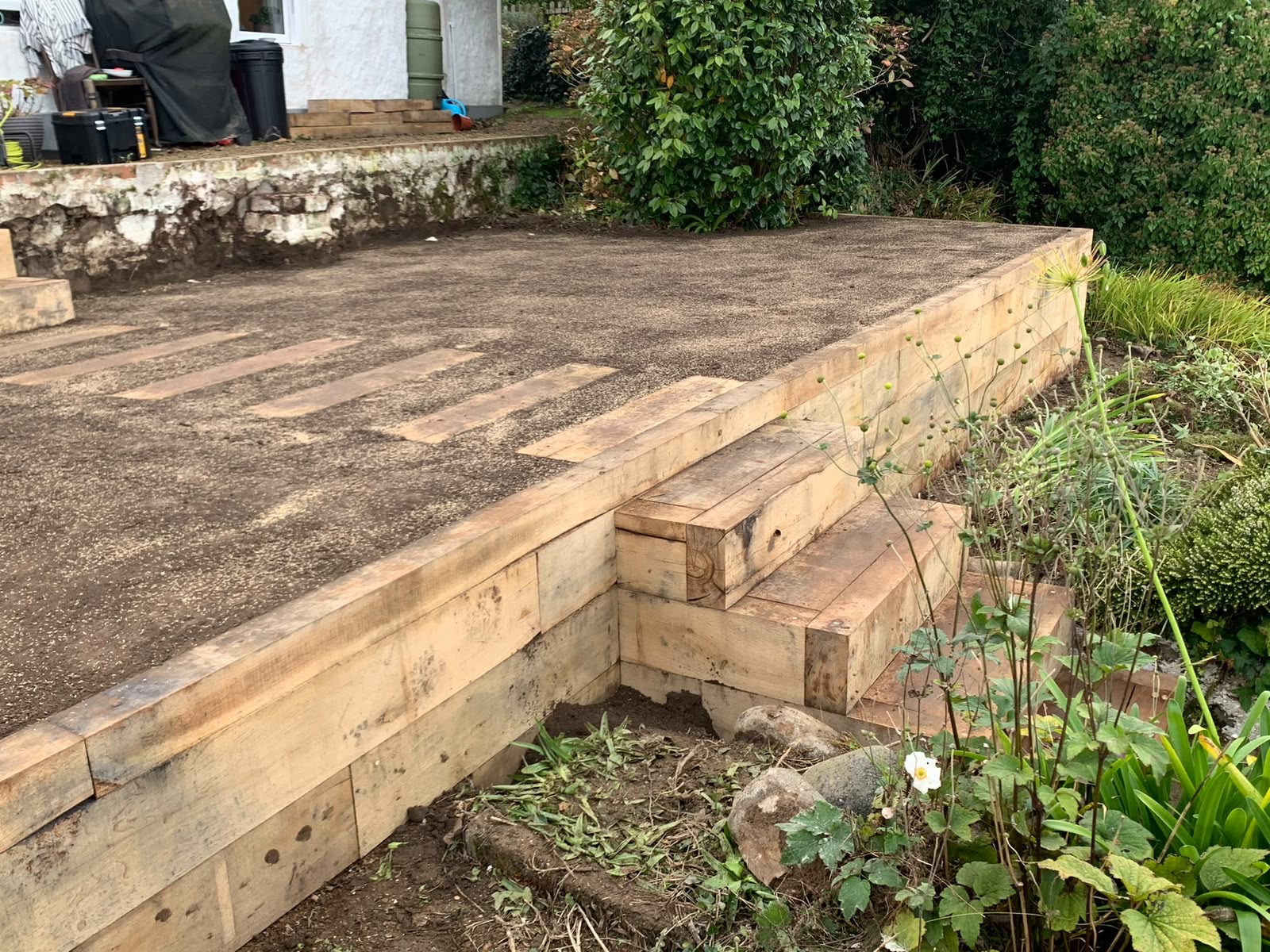 Completed sleeper terrace and steps with the lawn area topsoiled