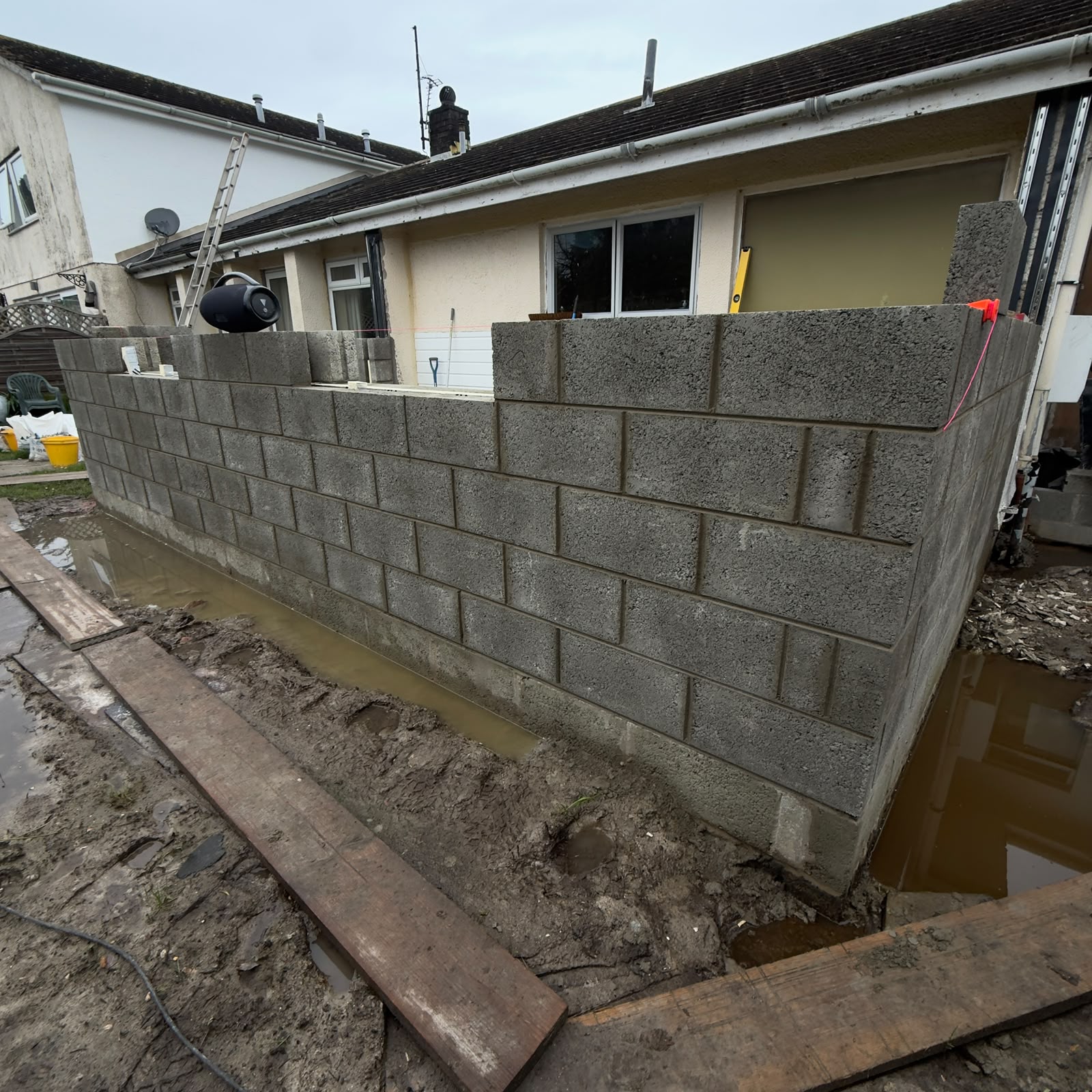 Blockwork walls rising off the new foundations