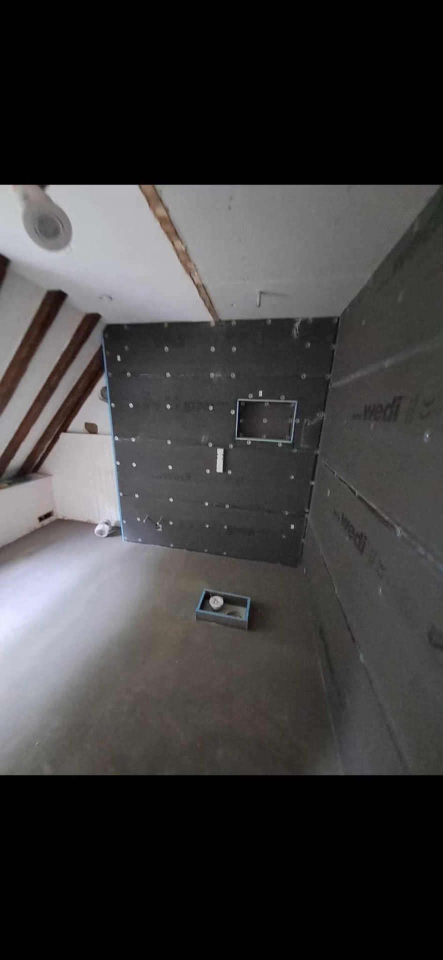 Wedi tanking boards and recessed niche formed to the new shower enclosure