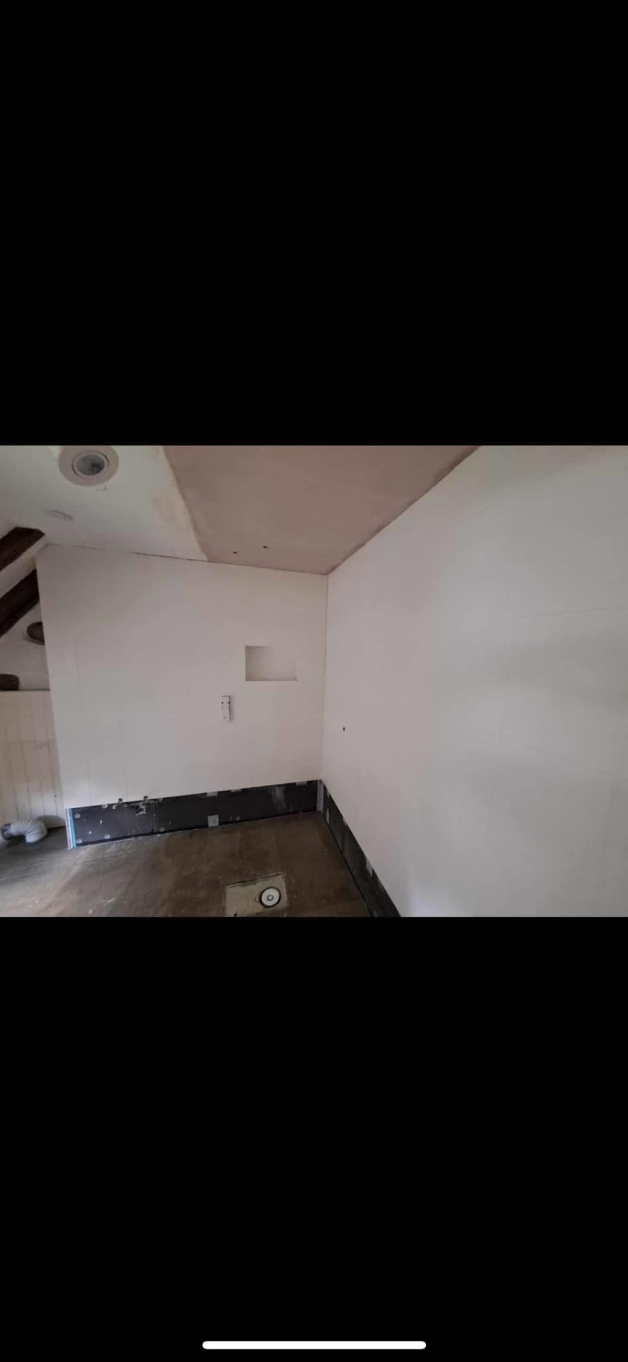 Ensuite plastered and prepared, with the recessed niche formed in the wall