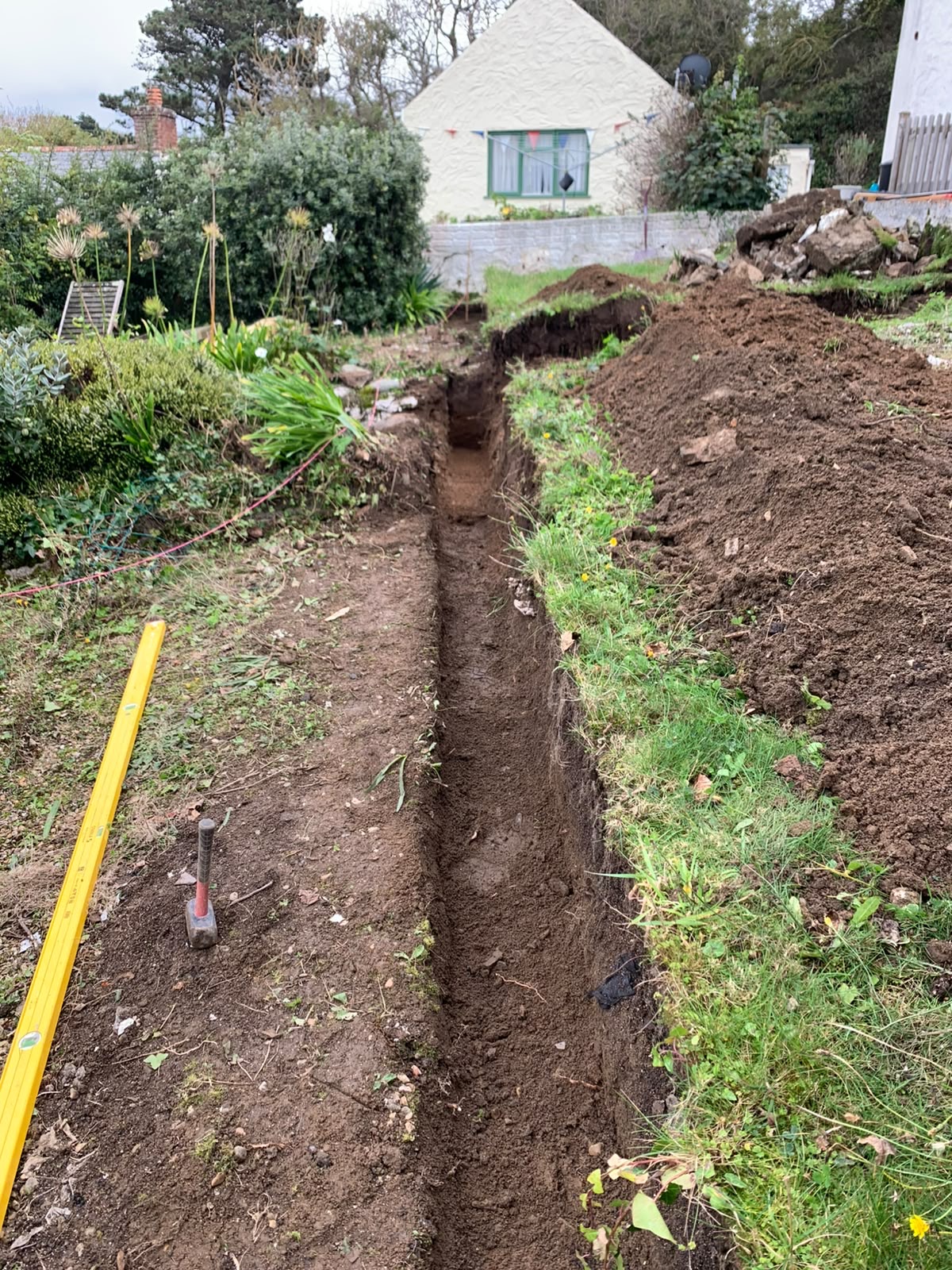 Trench excavated and set to line and level for the retaining wall