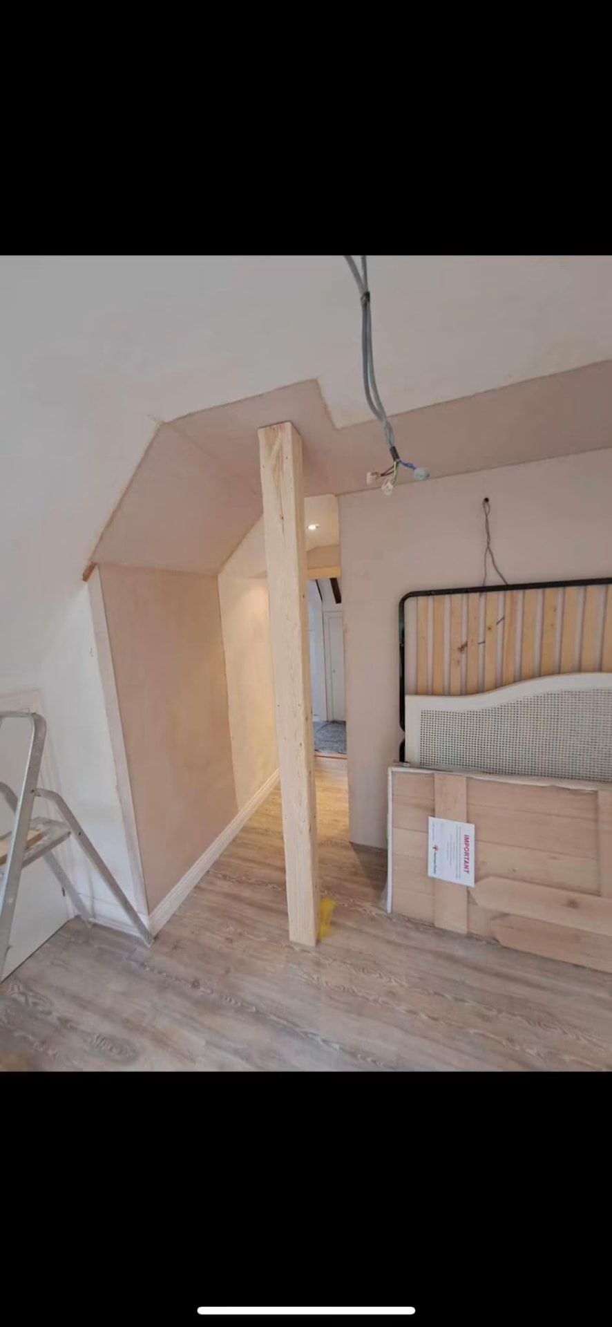 Newly plastered walls and bespoke beam boxing with luxury flooring laid