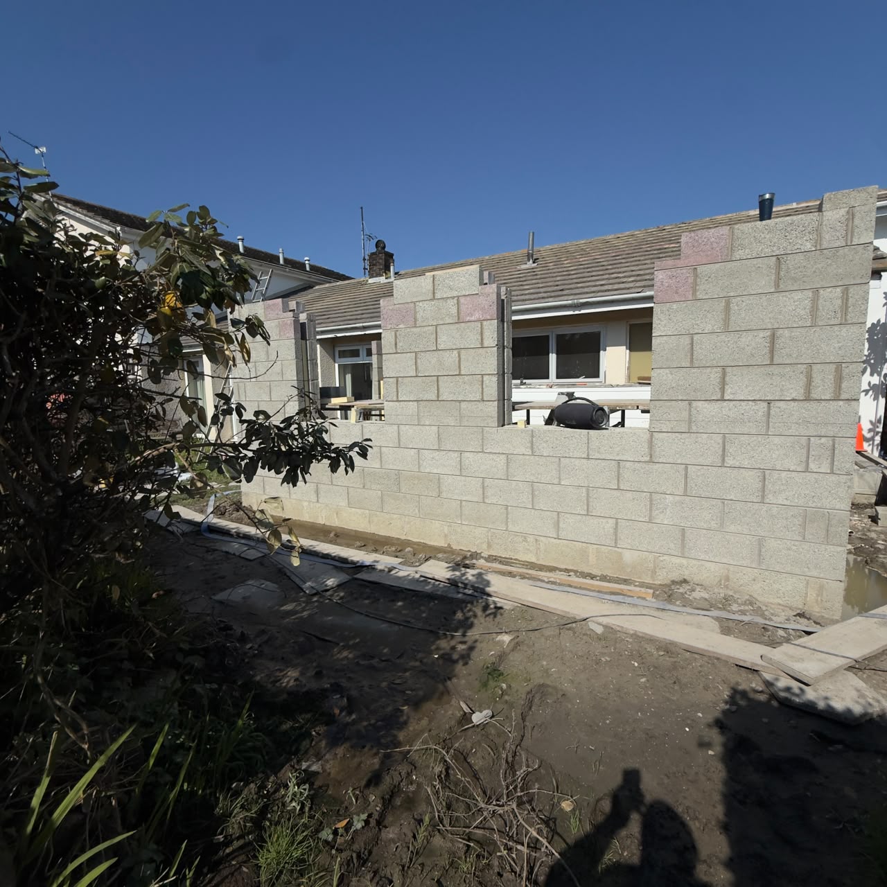 Walls rising with lintels set over the openings